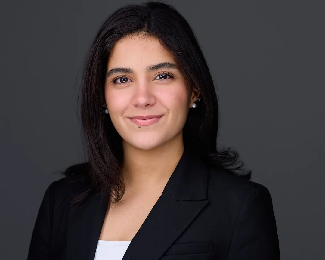 Law firm team headshot with consistent professional styling across attorneys