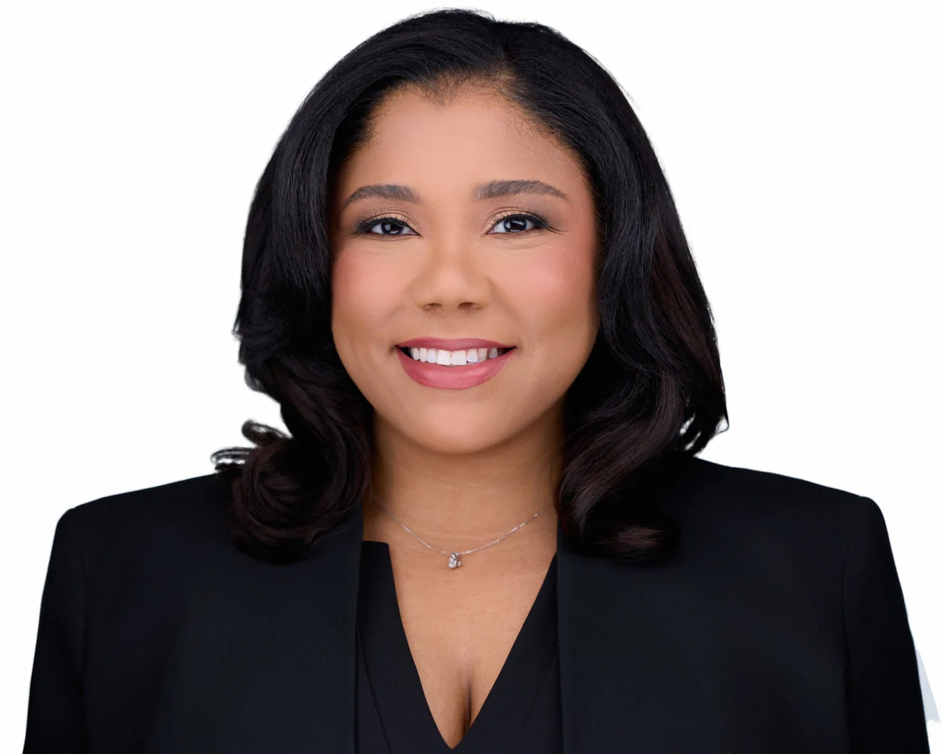 Headshot for the legal profession showing a confident, authoritative attorney in studio lighting