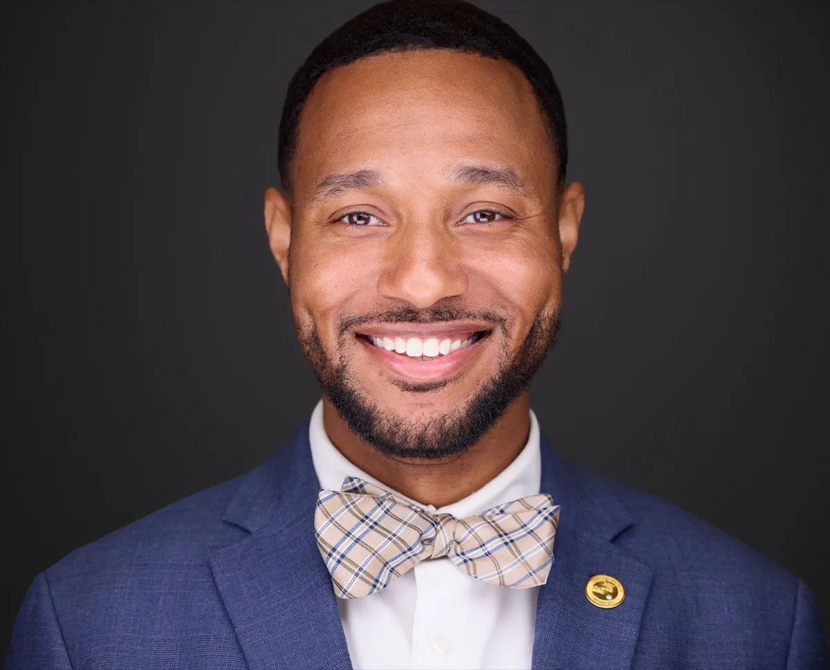 Professional business headshot example showing clean lighting and modern style