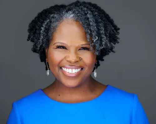 Professional headshot for Washington DC executive with confident warm expression