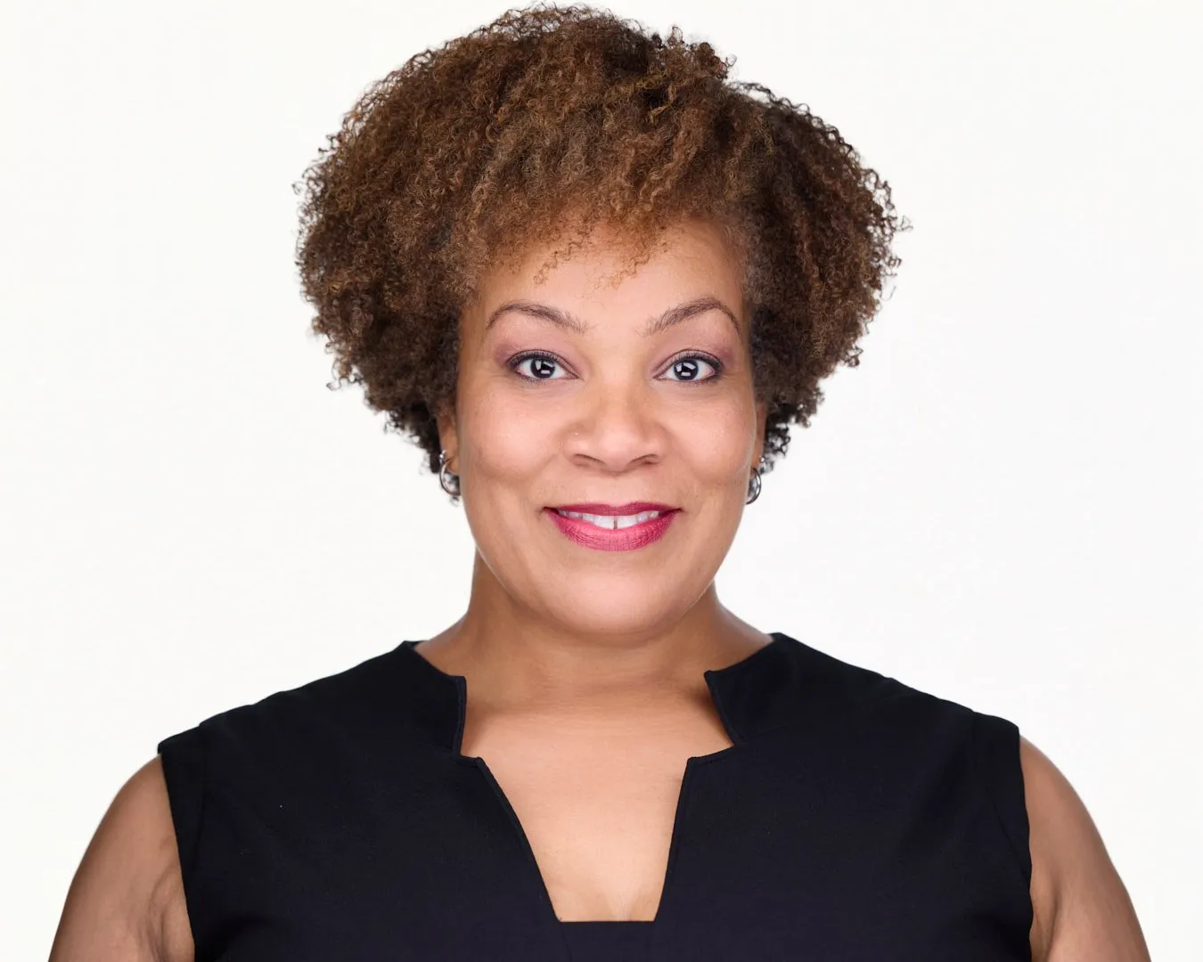 Professional headshot of woman with natural smile