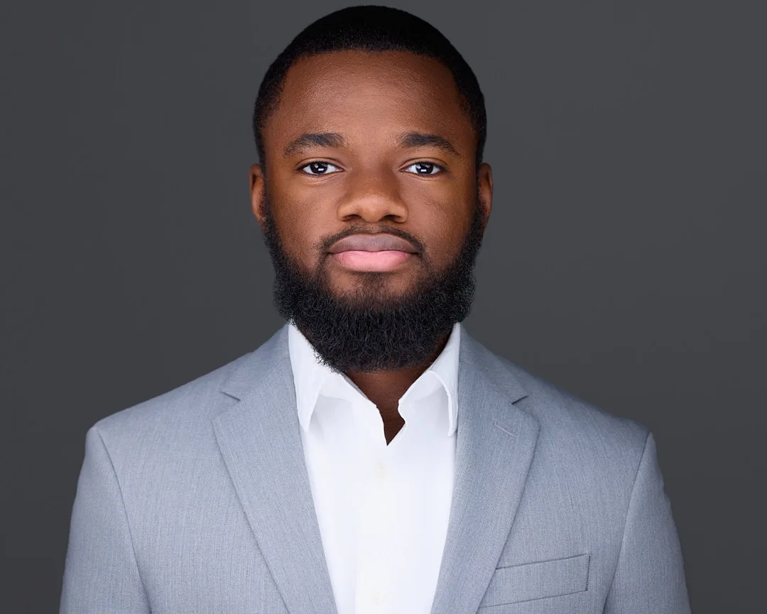 Corporate headshot for a Northern Virginia business professional with polished business styling