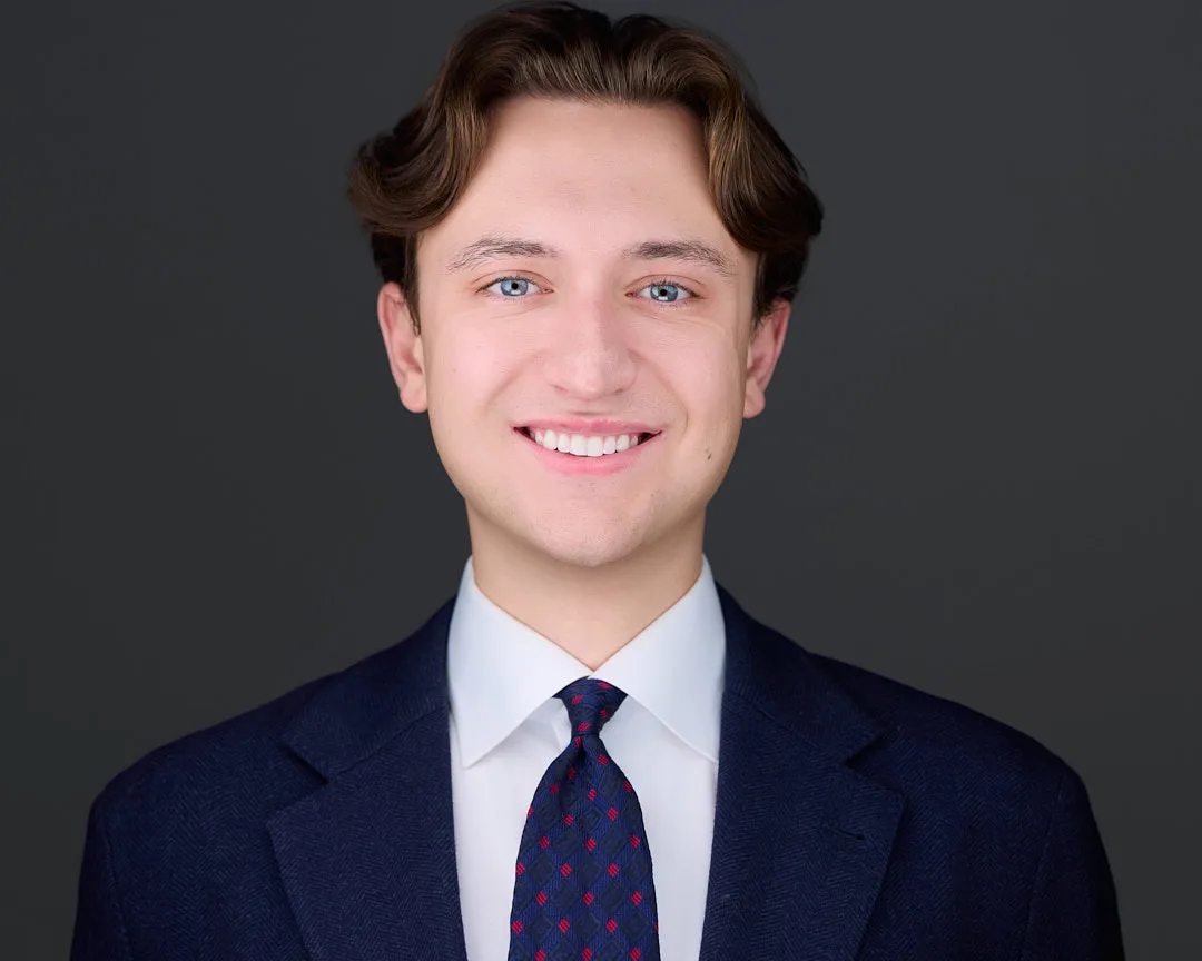Professional headshot of a Northern Virginia client with confident studio styling